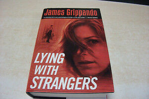 Lying With Strangers by James Grippando