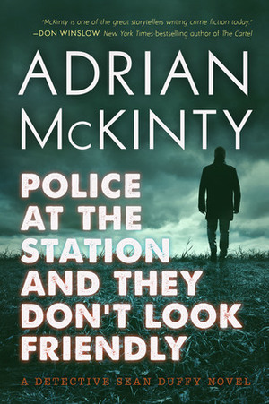 Police at the Station and They Don't Look Friendly by Adrian McKinty