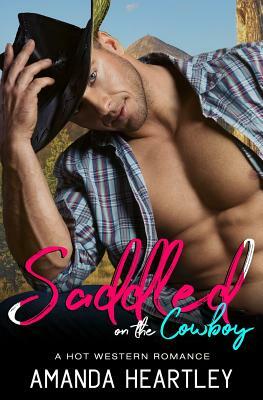 Saddled on the Cowboy: A Hot Western Romance by Amanda Heartley