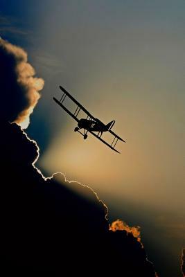 Biplane Silhouette: A Fixed-Wing Aircraft with Two Main Wings Stacked One Above the Other. the First Powered, Controlled Airplane to Fly, by Planners and Journals