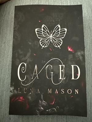 Caged by Luna Mason