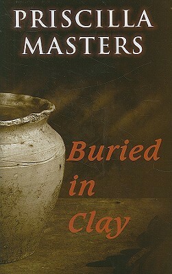 Buried in Clay by Priscilla Masters
