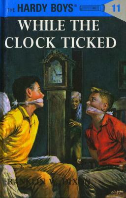 While The Clock Ticked by Franklin W. Dixon