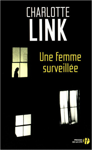 Une femme surveillée by Charlotte Link