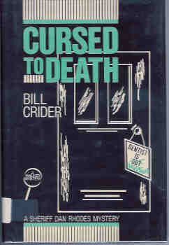 Cursed to Death by Bill Crider